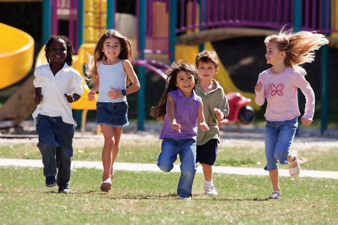 Students running on playground